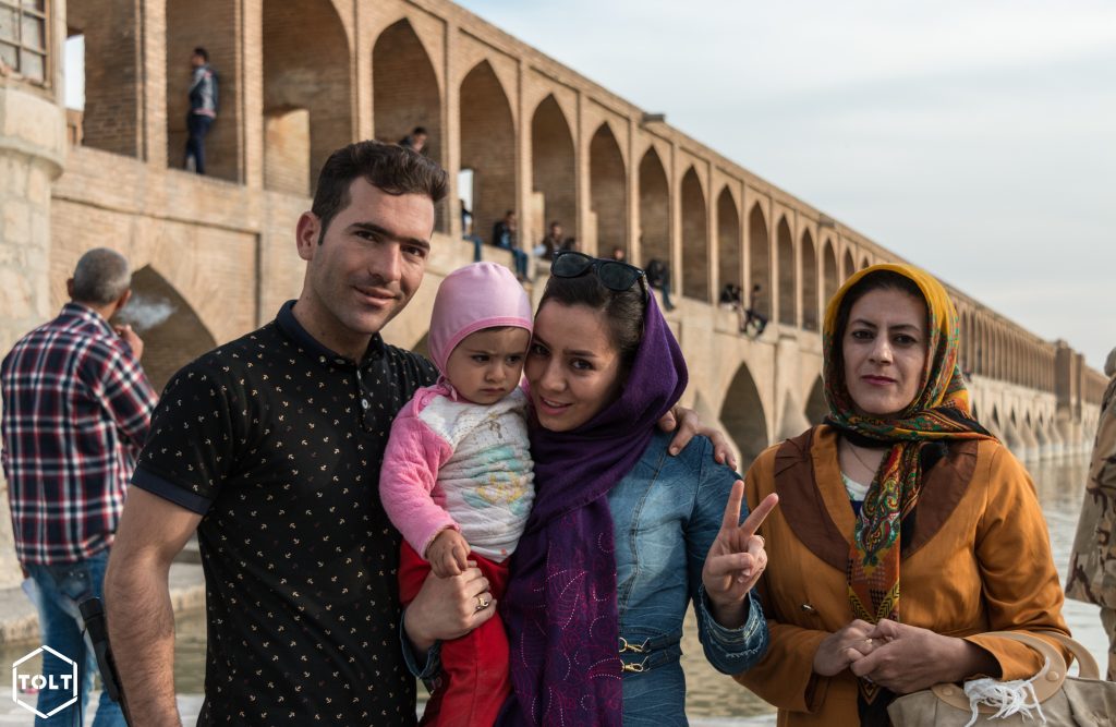 A family visiting Allāhverdi Khan Bridge (Si-o-seh pol) in Isfahan