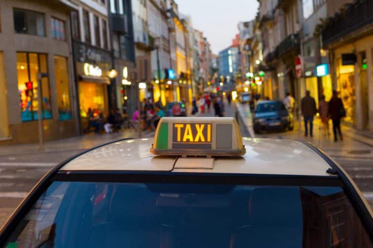 Taxi cab on an Old Town street of Porto, Portugal