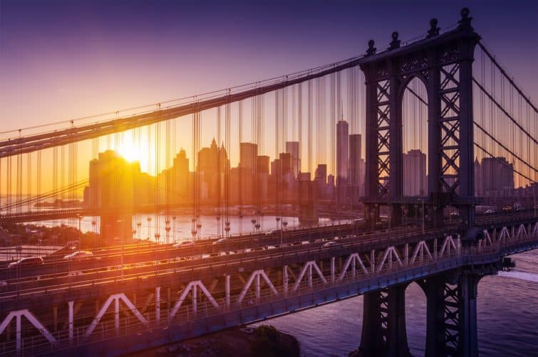 New York City - beautiful manhattan sunset with manhattan and brooklyn bridge