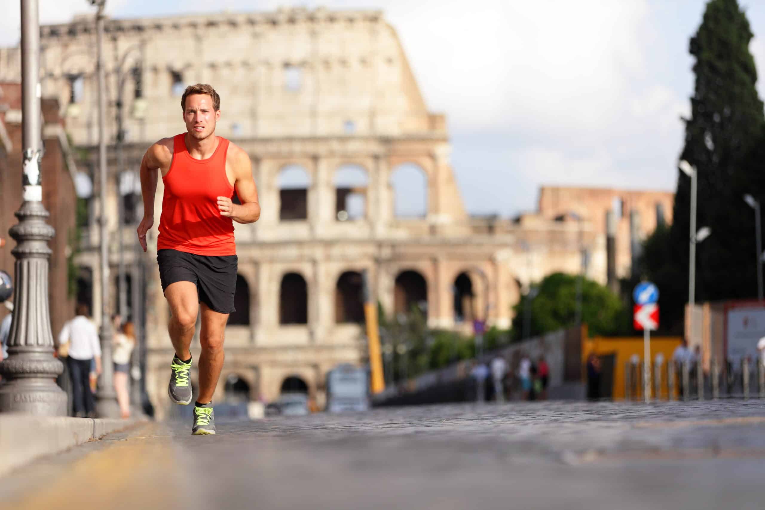 Running,Runner,Man,By,Colosseum,,Rome,,Italy.,Male,Athlete,Training