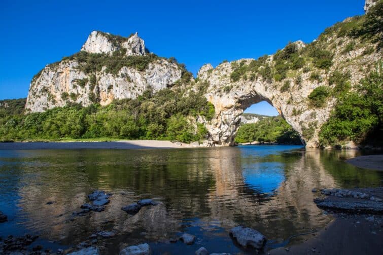 Famous natural stone bridge Pont d'Arc in the Gorges de l'Ardèche, France