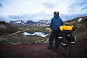 Biker enjoying a mountain bike ride around volcanic mountains in Iceland