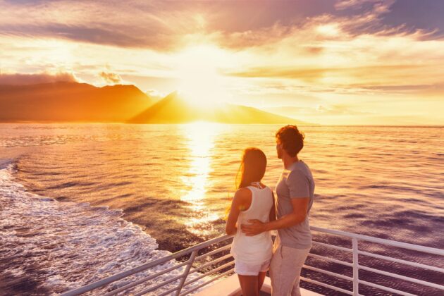 Couple enjoying sunset on a Mediterranean cruise
