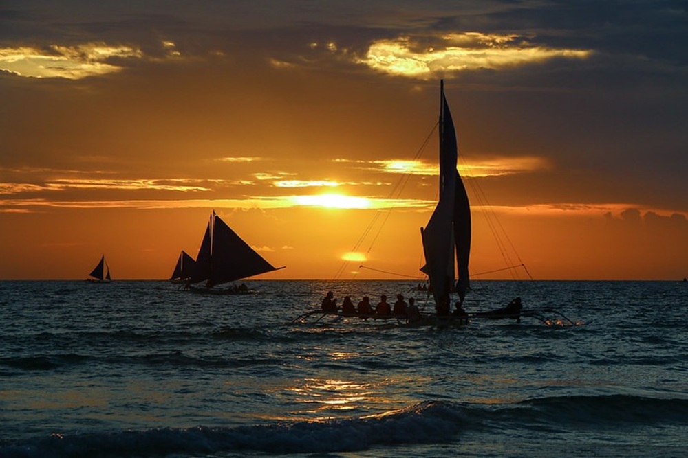 Le coucher de soleil en paraw, Boracay